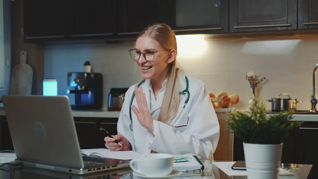 A doctor in a virtual consultation with a patient A doctor in a virtual consultation with a patient