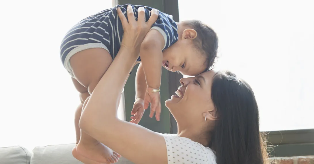 A person holding a baby
A person holding a baby