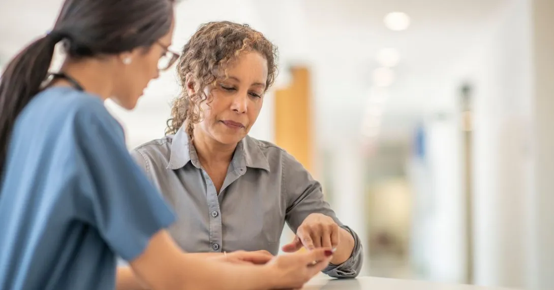 Doctor talks to patient