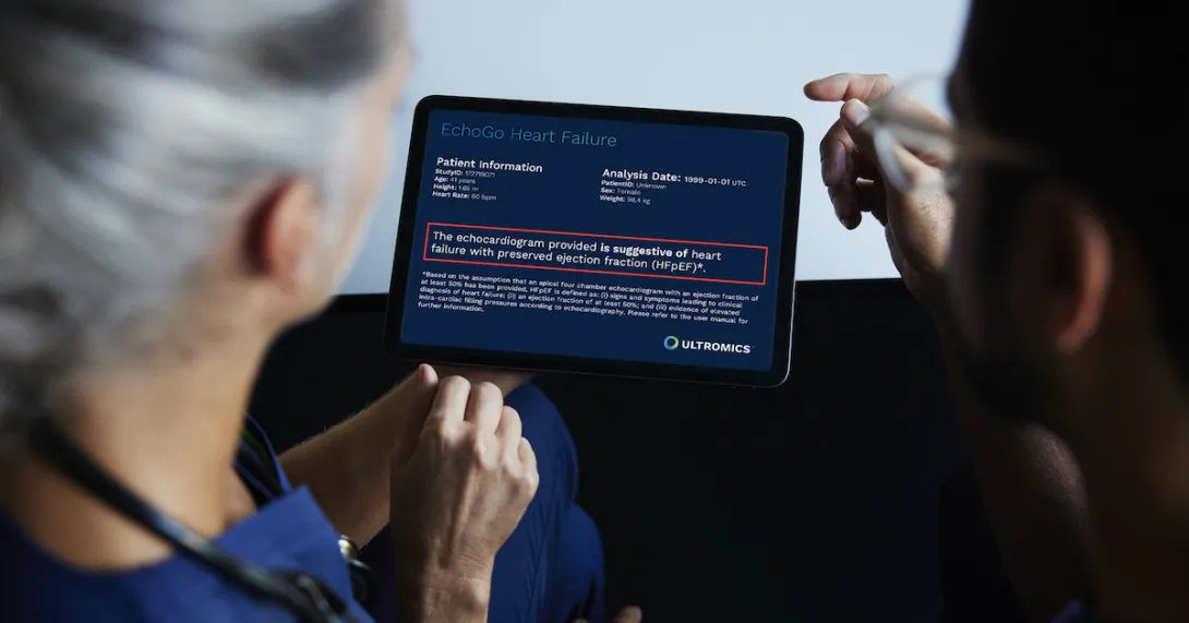 Two people reading a tablet with analysis from EchoGo Heart Failure Two people reading a tablet with analysis from EchoGo Heart Failure