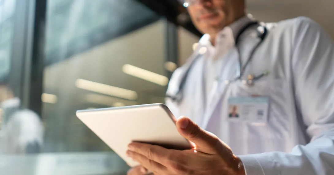 Healthcare provider holding a tablet Healthcare provider holding a tablet