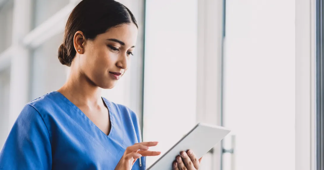 Healthcare provider on a tablet Healthcare provider on a tablet