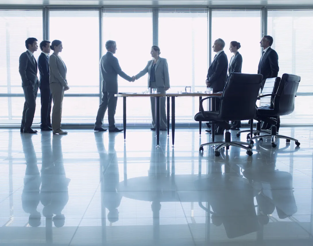 Business people shaking hands Business people shaking hands