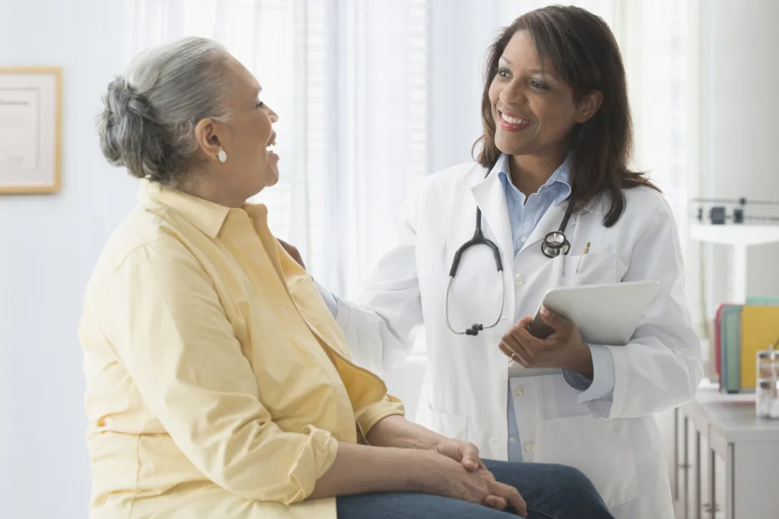 Doctor talks to patient