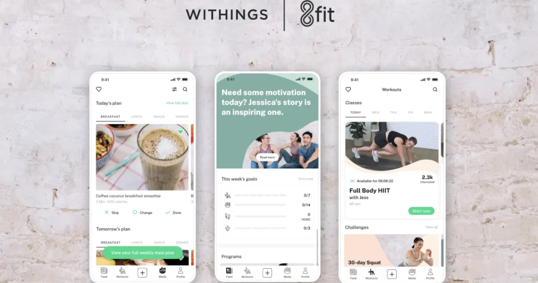 Images of smartphones displaying 8fit's app with workout classes and a meal plan Images of smartphones displaying 8fit's app with workout classes and a meal plan