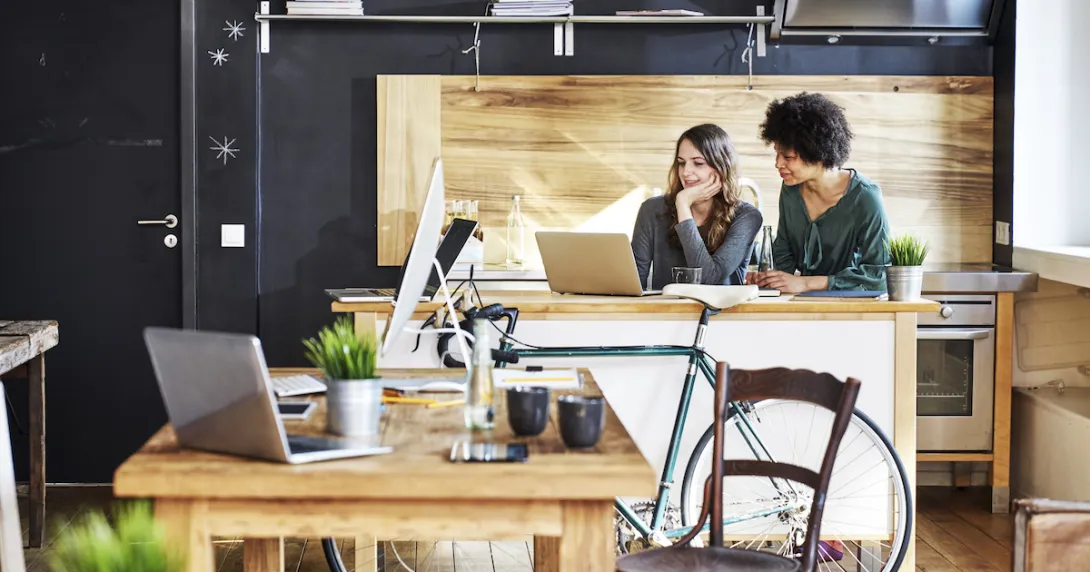 Two workers at a desk