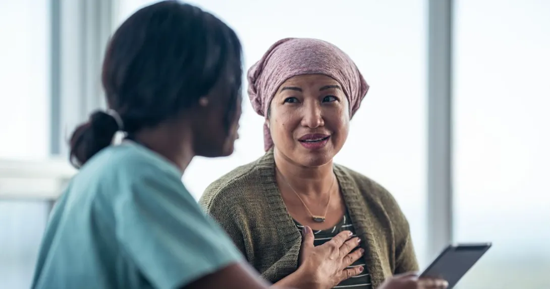 A cancer patient talking to a provider A cancer patient talking to a provider