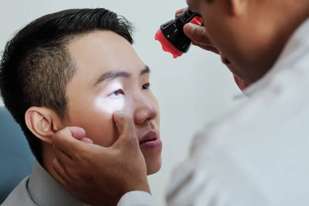 A patient having his eyes examined.