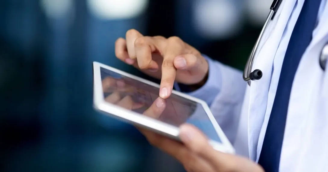 Doctor using tablet