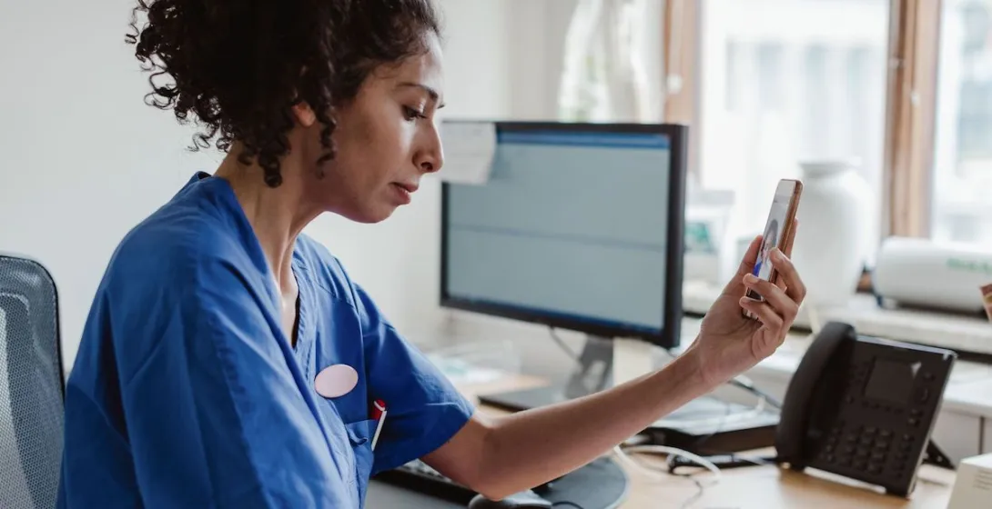 A telemedicine visit via smartphone. A telemedicine visit via smartphone.
