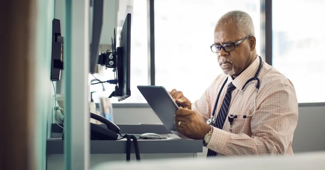 Physician using a tablet