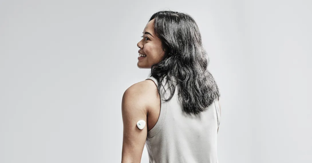 A model wearing the Nutromics lab-on-a-patch continuous monitoring device