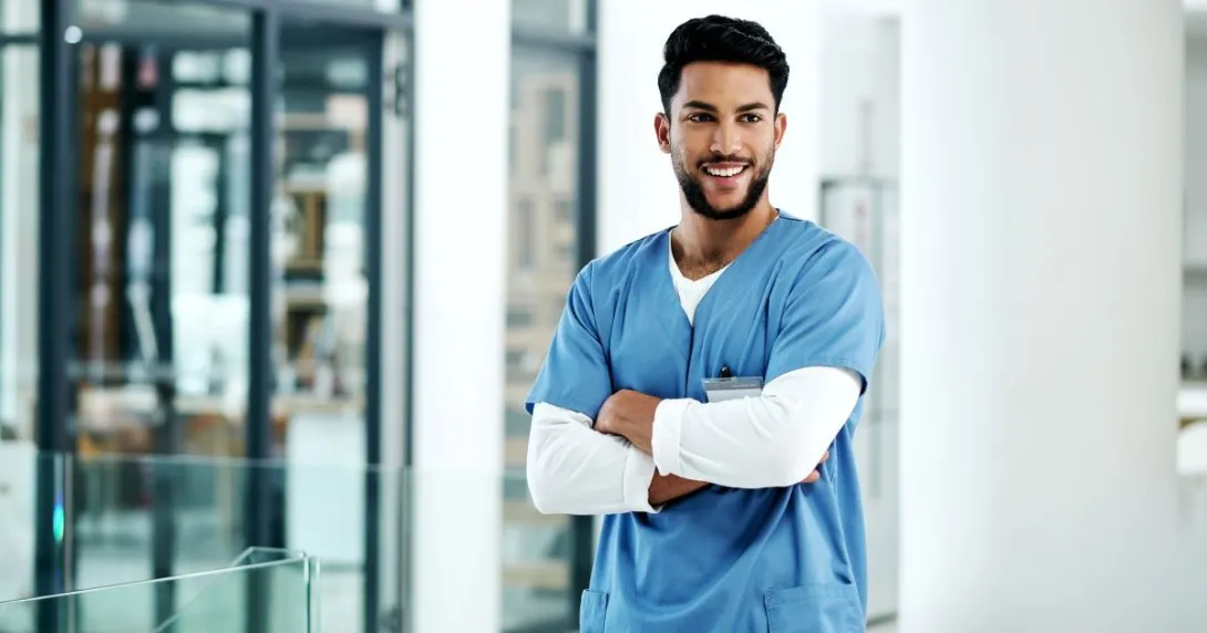 Person standing with arms crossed