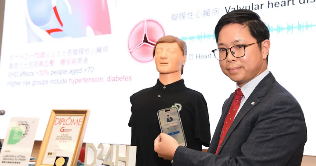 A researcher demonstrating the Vitogram mobile stethoscope app