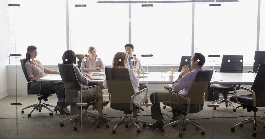 Executives at a conference table