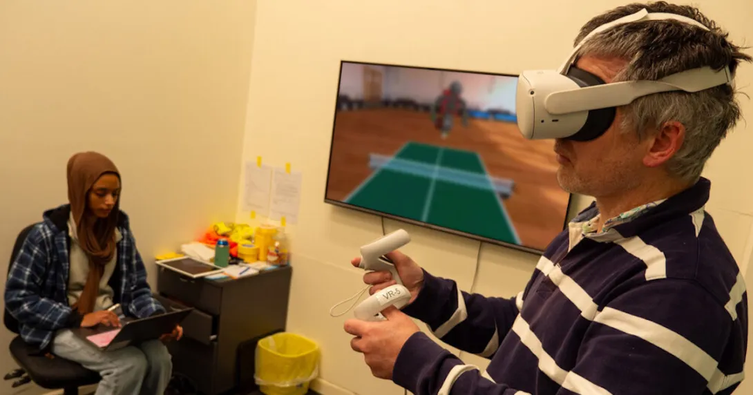 A volunteer participant of the Flinders University research using VR to do an exercise