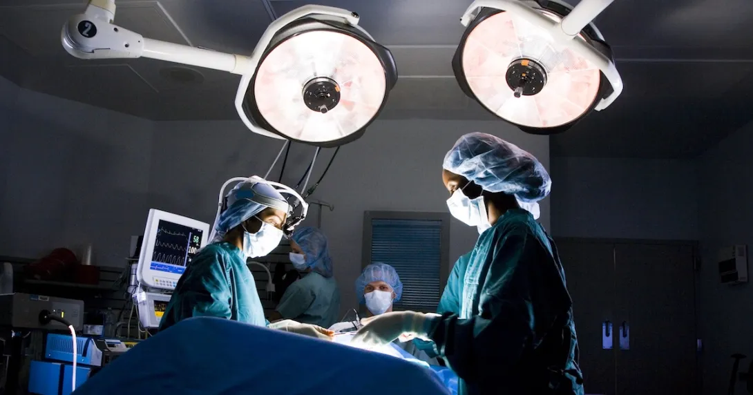 Clinicians performing surgery