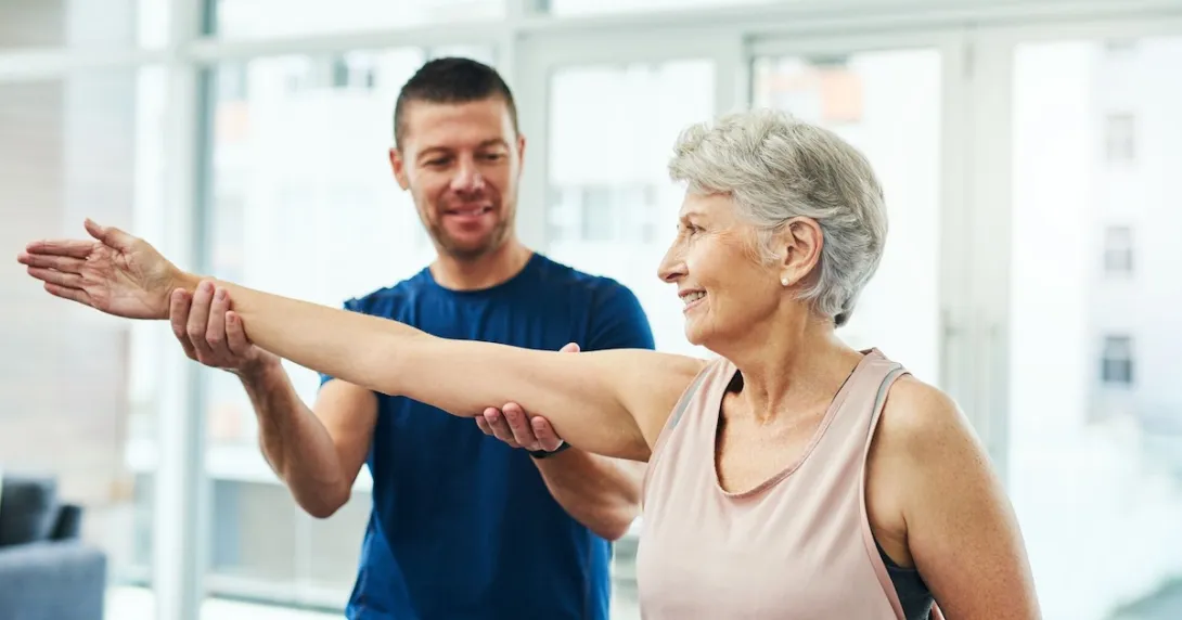 Two people stretching together