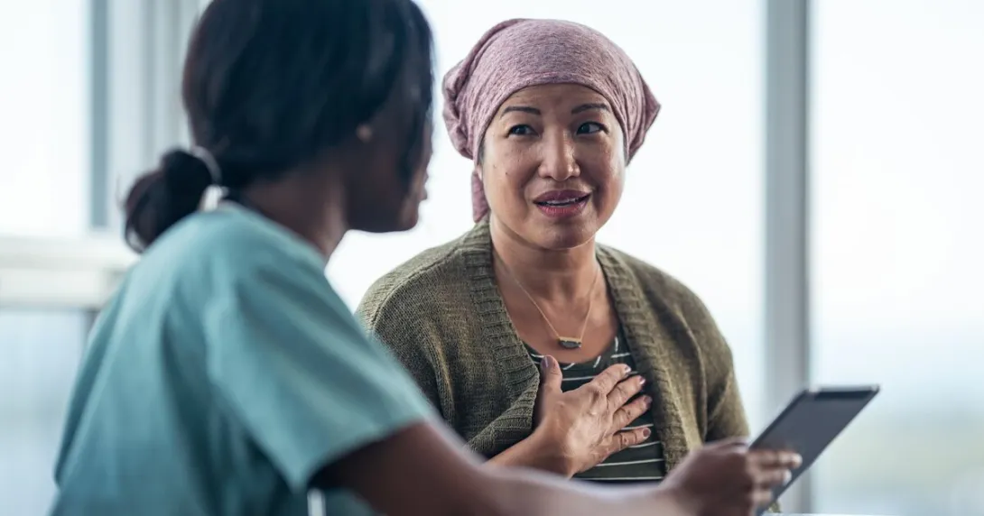 A cancer patient discussing with their doctor.